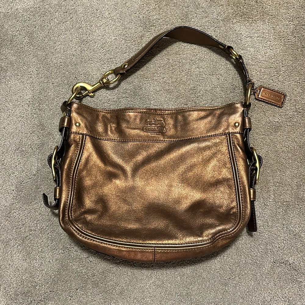 Bronze colored COACH bag